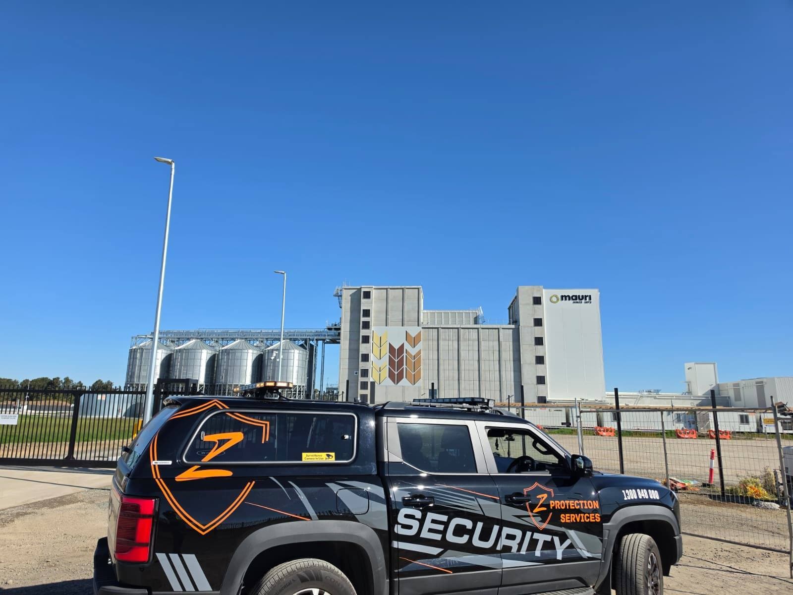 Z Protection Services patrol vehicle at a commercial site